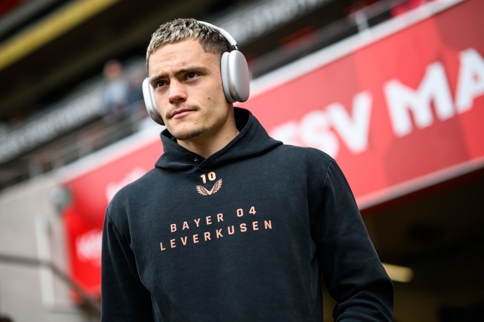 Florian Wirtz of Bayer 04 Leverkusen wearing headphones.
