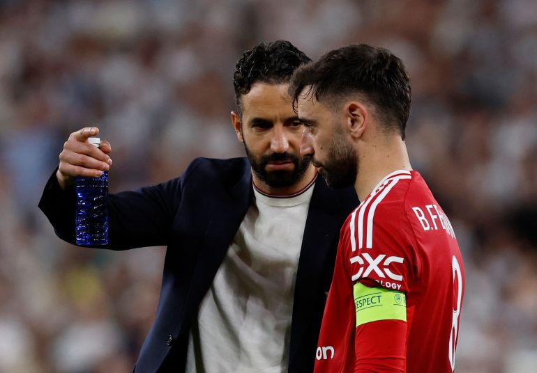 Europa League - Final - Tottenham Hotspur - Manchester United manager Ruben Amorim with Manchester United's Bruno Fernandes after the match