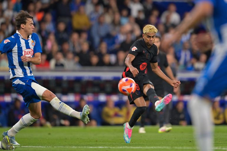 Barcelona's Lamine Yamal scores against Espanyol in La Liga