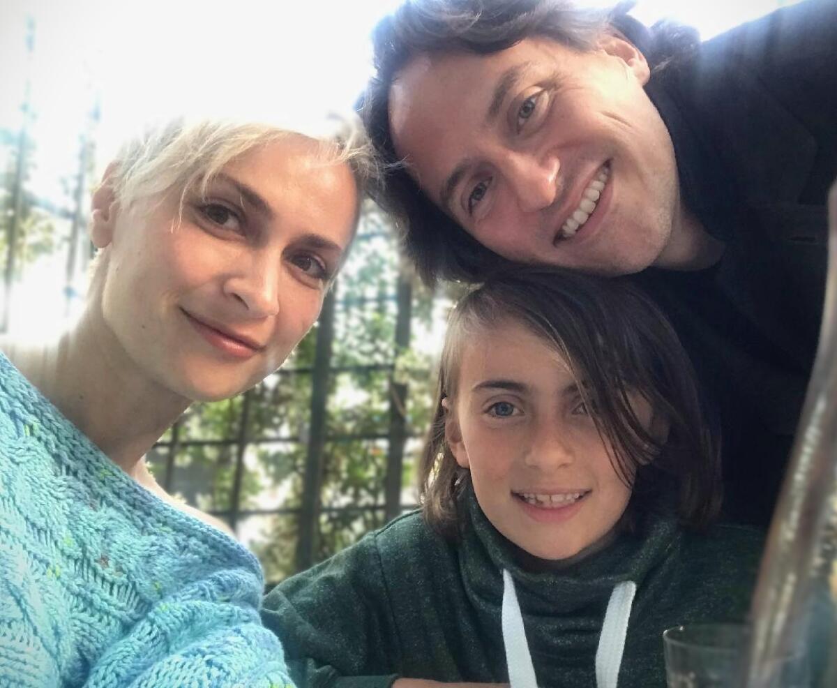 Cinematographer Halyna Hutchins with husband Matthew Hutchins and their son, Andros.