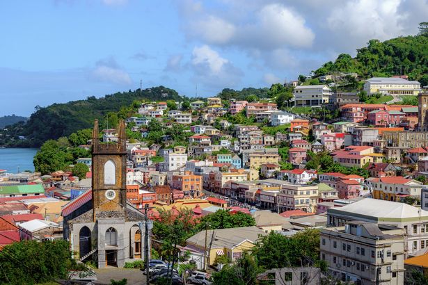 Where the Caribbean Sea meets colorful hillside homes  Exploring the vibrant capital of Grenada, where every corner tells a story. From the historic Anglican church tower to the bustling Carenage harbor, St. George's is a perfect blend of colonial charm and island life