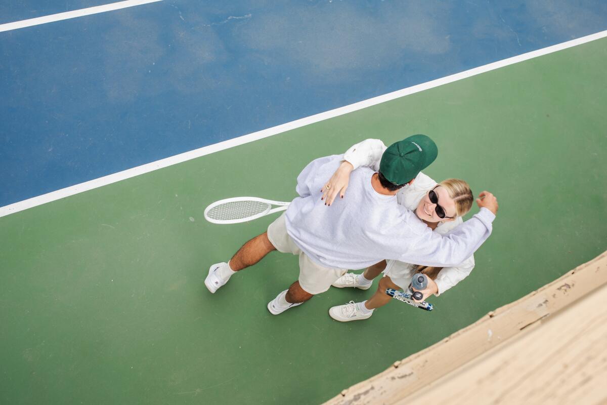 Kacper Owsian greets someone to his Tennis Clinic in Beverly Hills.