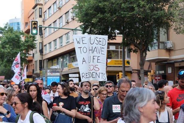 PALMA DE MALLORCA, MAJORCA BALE, SPAIN - MAY 25: Dozens of people during a demonstration against tourist overcrowding and for decent housing, between Parc de ses Estacions and Plaza de España, on 25 May, 2024 in Palma de Mallorca, Mallorca, Balearic Islands, Spain. Under the slogan 'Mallorca is not for sale!', the collective Banc del Temps de Sencelles has called for a demonstration against tourist overcrowding. Banc del Temps de Sencelles is a collective that in recent weeks has been leading actions to make visible the impacts of the tourism industry, especially in the housing market. (Photo By Isaac Buj/Europa Press via Getty Images)