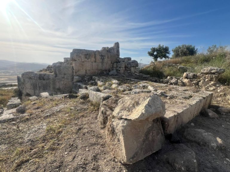 Stars of David graffitied on the ancient Hellenic wall in Sebastia