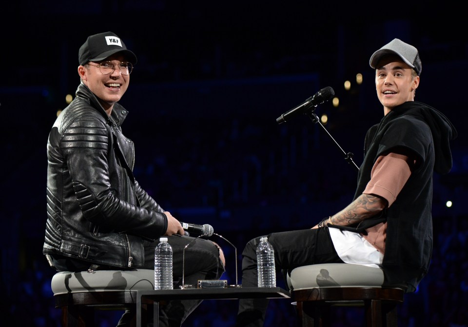 Pastor Judah Smith and Justin Bieber onstage at an event.