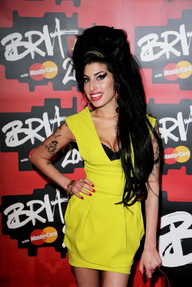 Singer Amy Winehouse arrives at The BRIT Awards 2007 in association with MasterCard at Earls Court 1 on February 14, 2007 in London, England. 