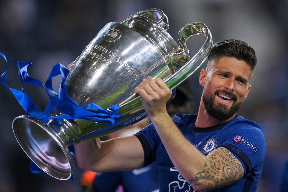Olivier Giroud of Chelsea celebrating with the Champions League trophy.