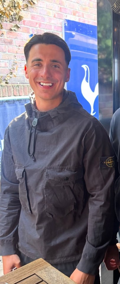 Tommy Bradley in a dark gray jacket.