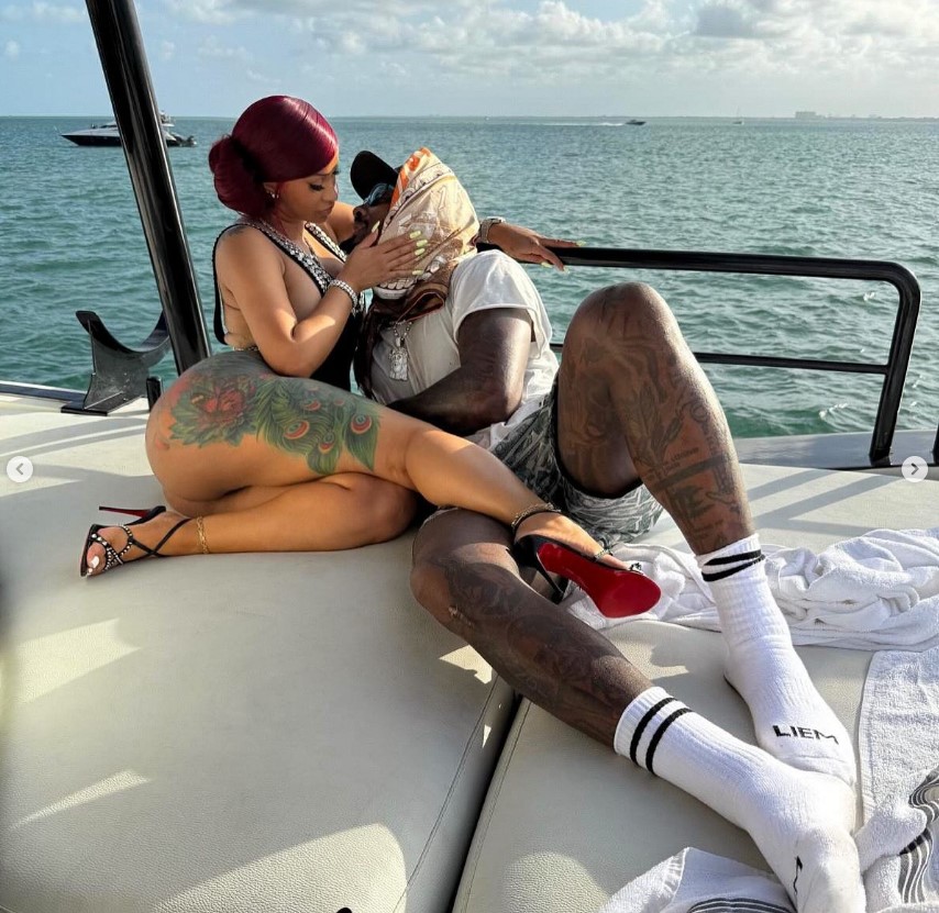 Cardi B and her boyfriend on a boat.