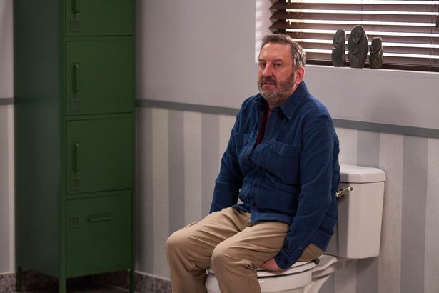 Lee Mack sat on a toilet