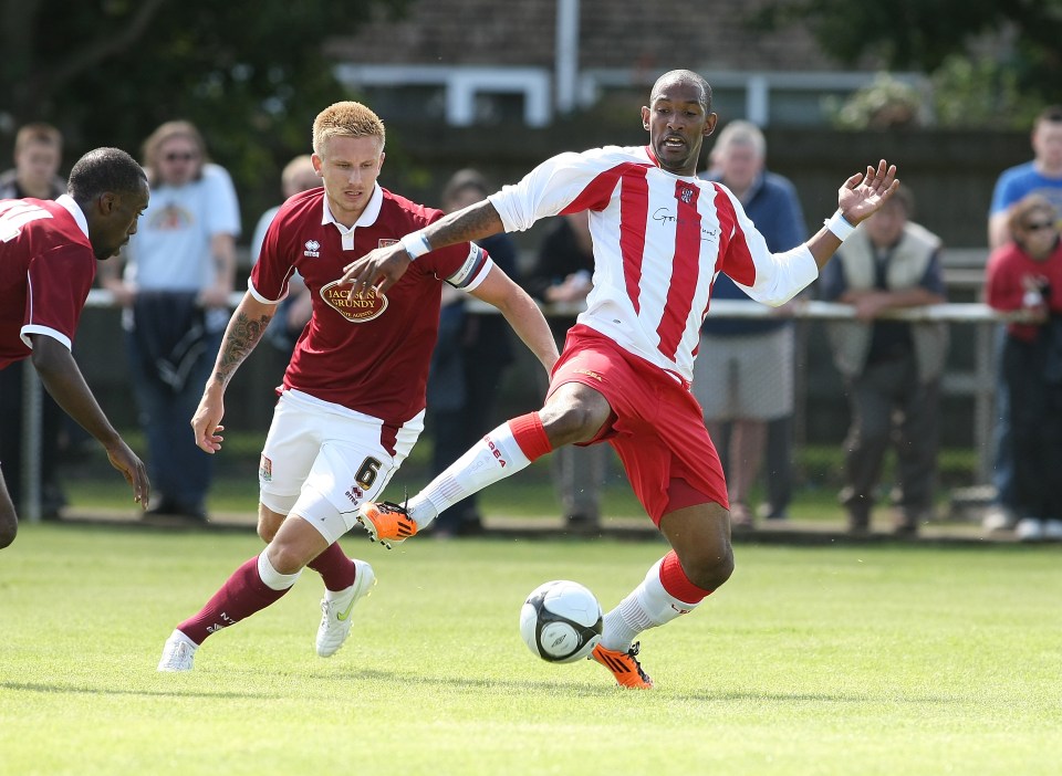 Soccer player controlling the ball during a match.