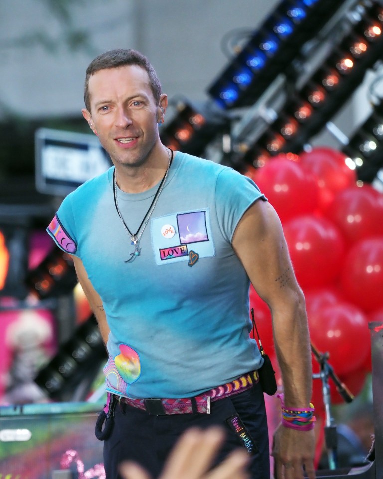 Chris Martin of Coldplay performing at Rockefeller Plaza.