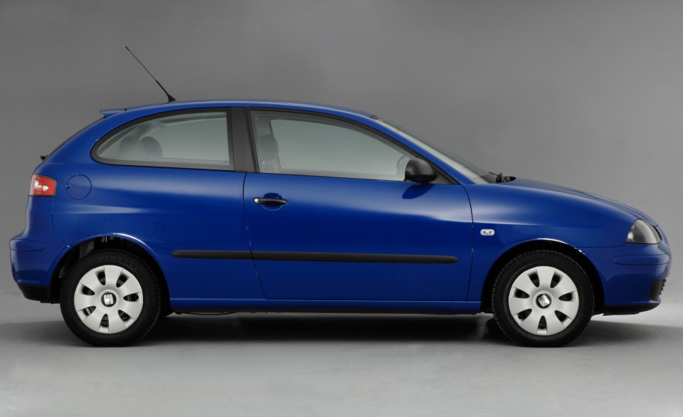 Side view of a blue Seat Ibiza.