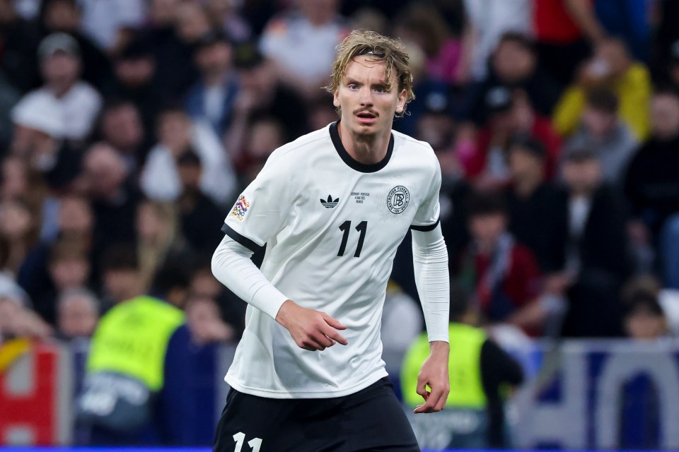 Nick Woltemade, German soccer player, on the field.
