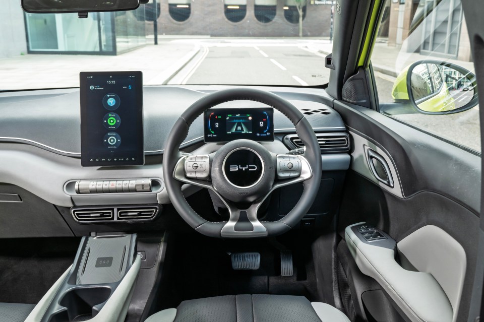 BYD Atto 3 car interior dashboard and steering wheel.