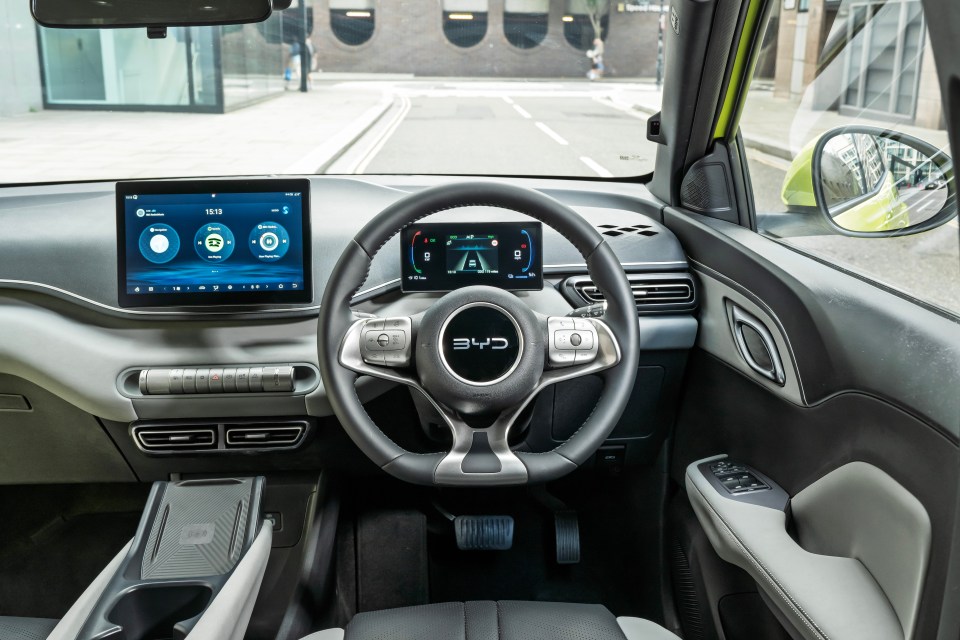 BYD car interior with dashboard and steering wheel.