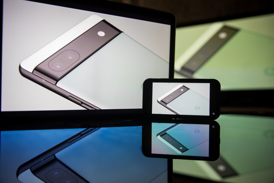A Google Pixel 6a smartphone displayed on a tablet and smaller screen at a Google I/O Developers Conference.