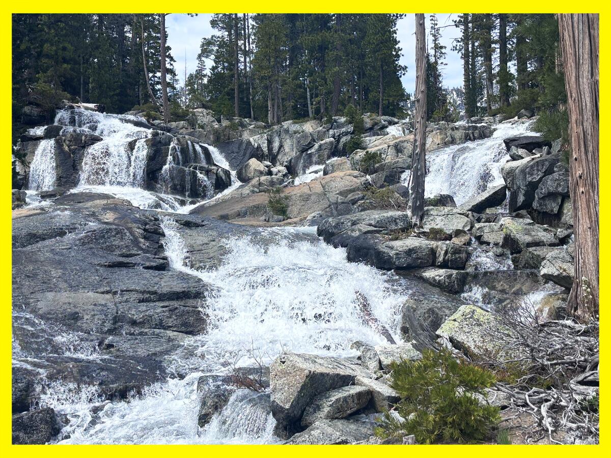 Falls cascading down multiple levels of rocks.