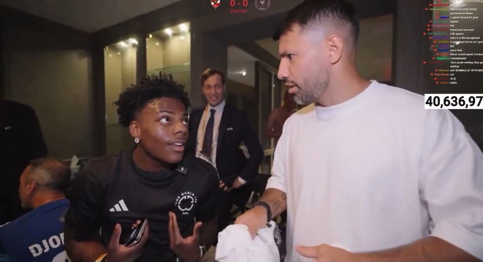 Sergio Aguero talking to a young soccer player.