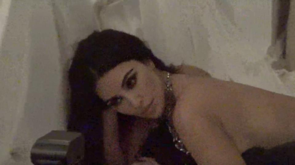 Kim Kardashian in a suggestive pose.
