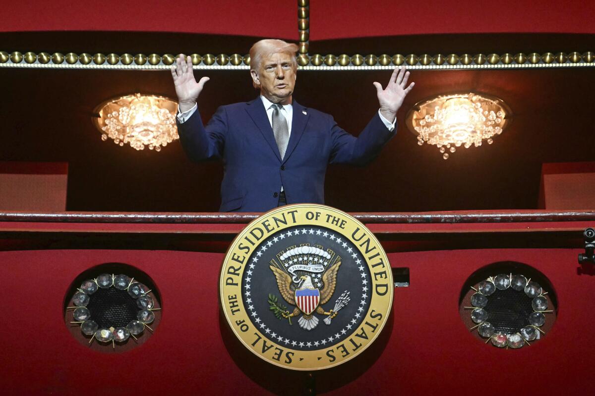 Trump stands in the presidential box as he tours the Kennedy Center on Monday, March 17, 2025.