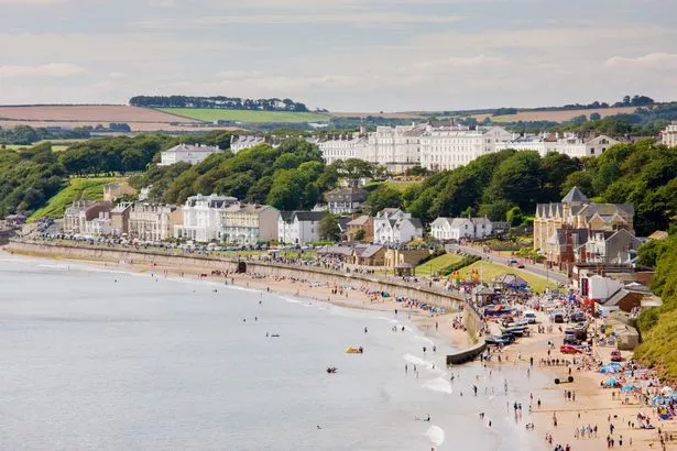 Filey esplanade and beach in East Yorkshire, England, UK