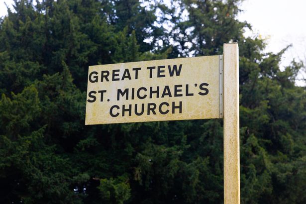 Image of sign pointing directions to St. Michael's church