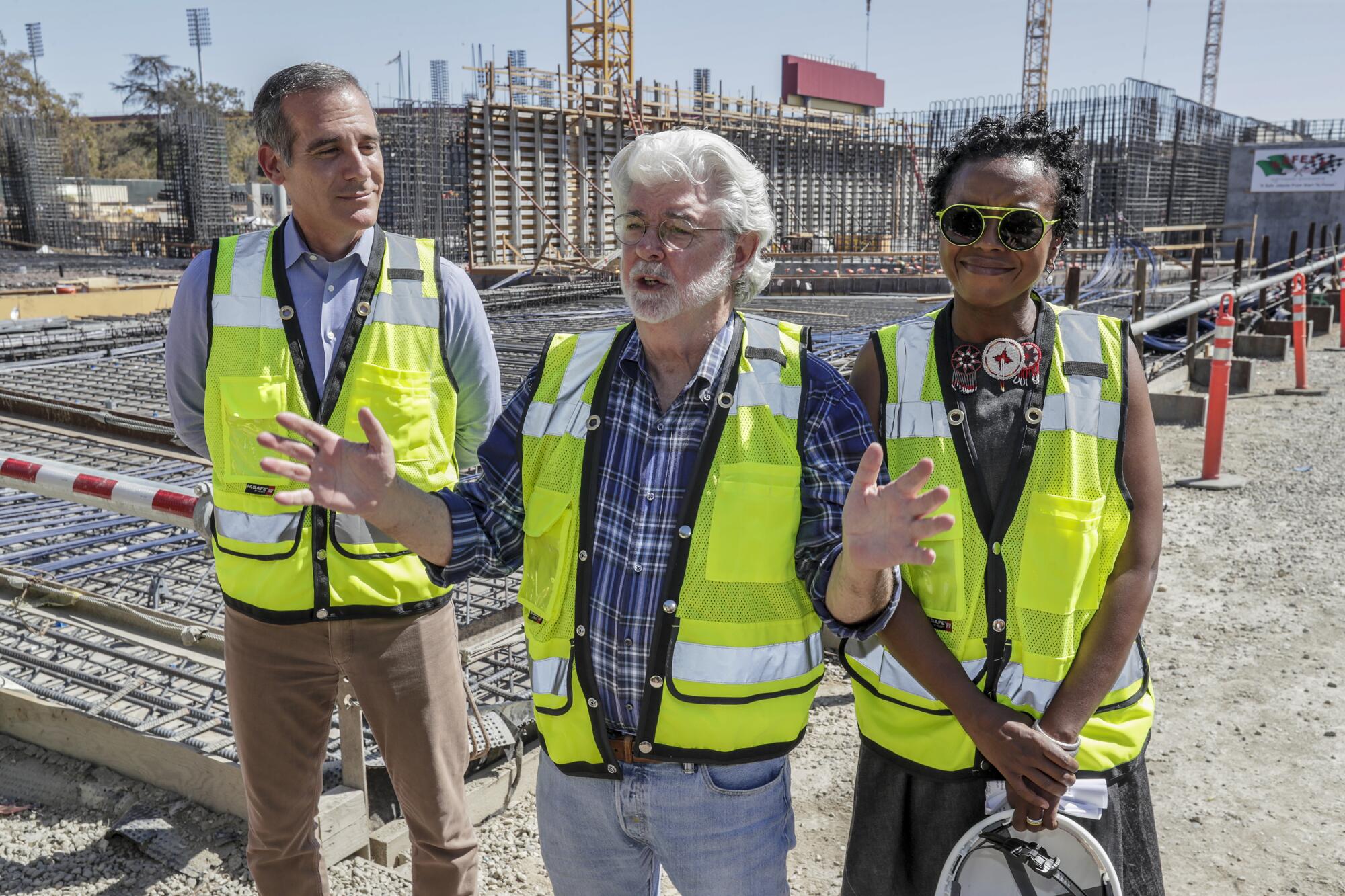 George Lucas with wife Mellody Hobson and Mayor Eric Garcetti in 2019 when the Lucas Museum was in its early stages.