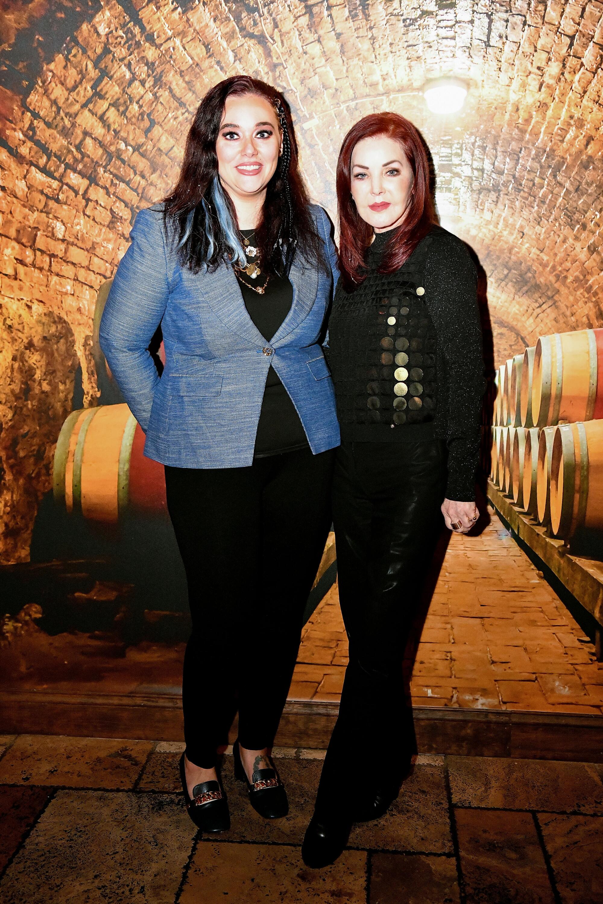 Dame Brigitte Kruse and Priscilla Presley pose during an event in Orlando 