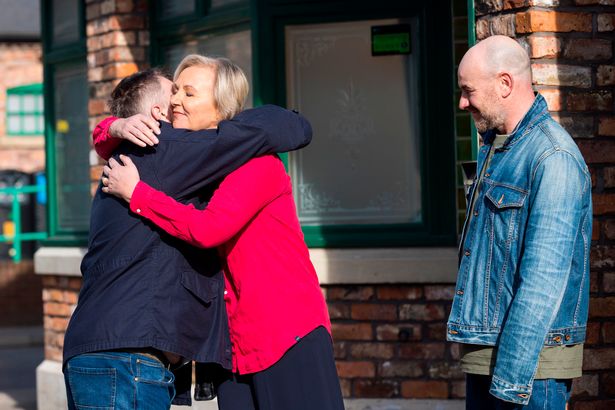 eileen hugging sons 