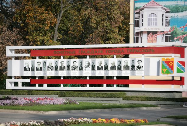 TIRASPOL, MOLDOVA - OCTOBER 19: A board of famous citizens of Tiraspol seen on October 19, 2008 in Tiraspol, Moldova. Tiraspol is the second largest city in Moldova and is the capital and administrative centre of the de facto independent Pridnestrovian Moldavian Republic (Transnistria). The city is located on the eastern bank of the Dniester River. Tiraspol is a regional hub of light industry, such as furniture and electrical goods production. The Trans-Dnistrian Moldavian Republic, locatet in the eastern region of the country, is internationally not acknowledged but does have ist own president, currency and army. Transnistria - an internationally unrecognized state  is part of Moldavia. The region has been de facto idependent since 1991, after making a unilateral declaration of indepenence from Moldova and successfully defeated Moldavian forces in the war of Transnistria. Since than a ceasefire has held but Transnistria - where the most of the Moldavian Industry is located - is still a "frozen conflict" region. (Photo by Matthias Schumann/Getty Images)
