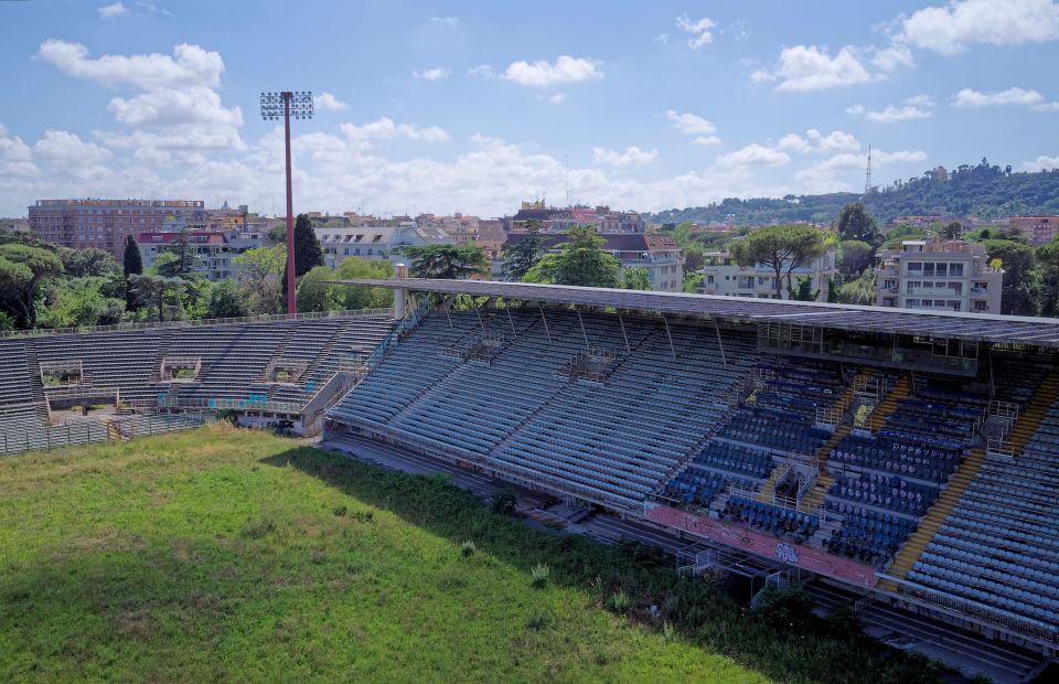 Aerial view of Flaminio Stadium in Rome, overgrown and vandalized.
