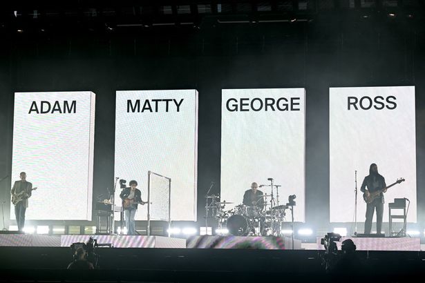 The 1975 on stage during their Glastonbury set in 2025.