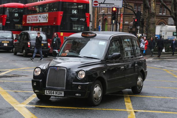 London classic vintage cabs in the streets of the center of the City of London in England, UK