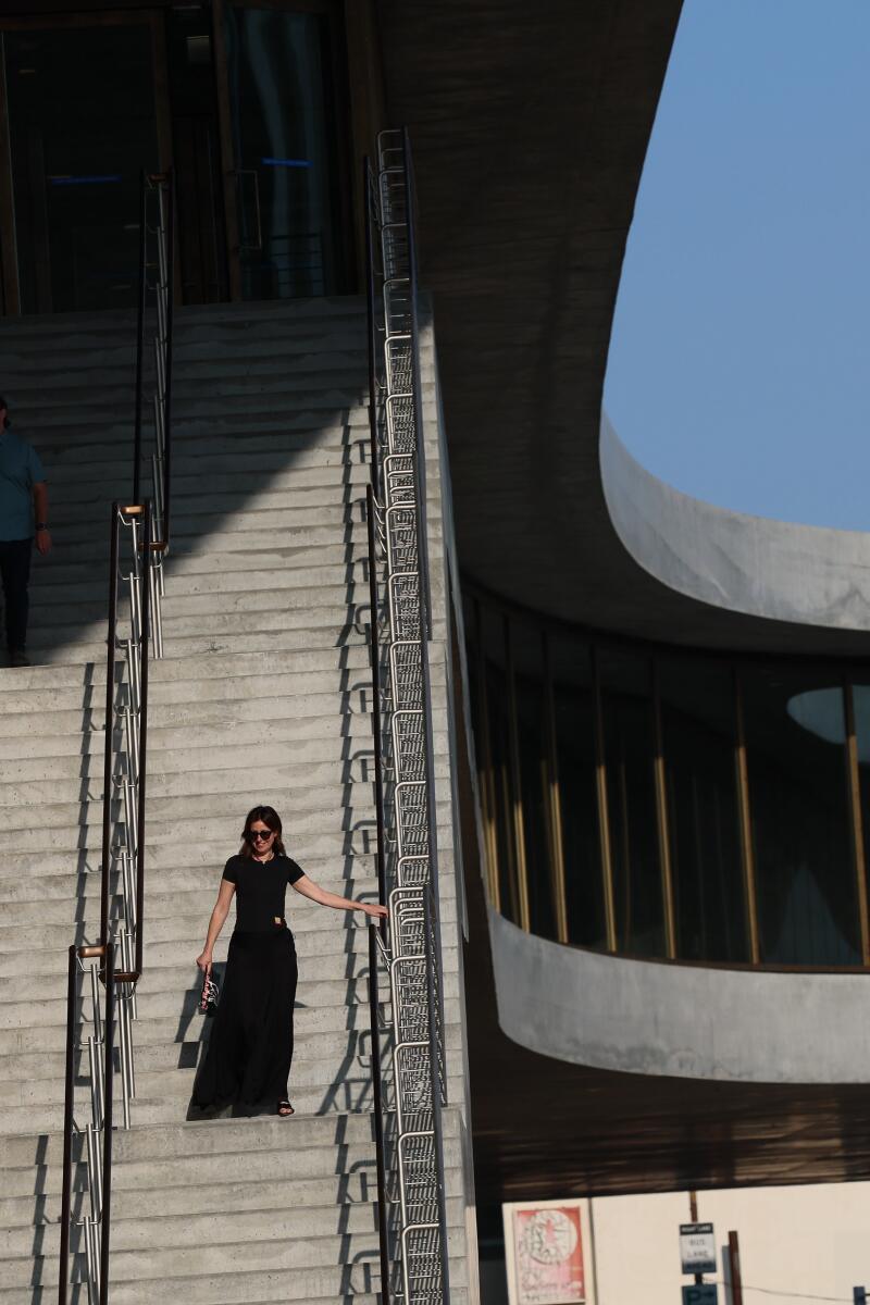 Los Angeles, CA - June 26: Guests tour the space as LACMA opens its new main building to media and museum members at Los Angeles County Museum of Art in Los Angeles Thursday, June 26, 2025. The Peter Zumthor-designed building is empty - a single story expanse of raw concrete that crosses Wilshire Boulevard and purports to deliver views of the city. We want to give a readers a sense of what the building feels like inside, before all of the art gets installed later this year (and before curtains go up around all of that glass). (Allen J. Schaben / Los Angeles Times)