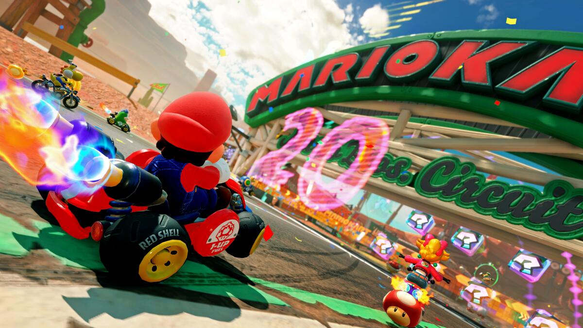 Mario and racers in the new "Mario Kart" game.