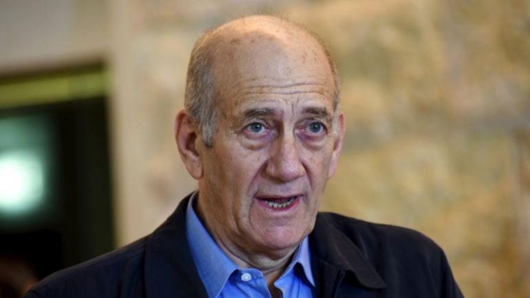 Former Israeli Prime Minister Olmert speaks to the media after a hearing at the Supreme Court in Jerusalem