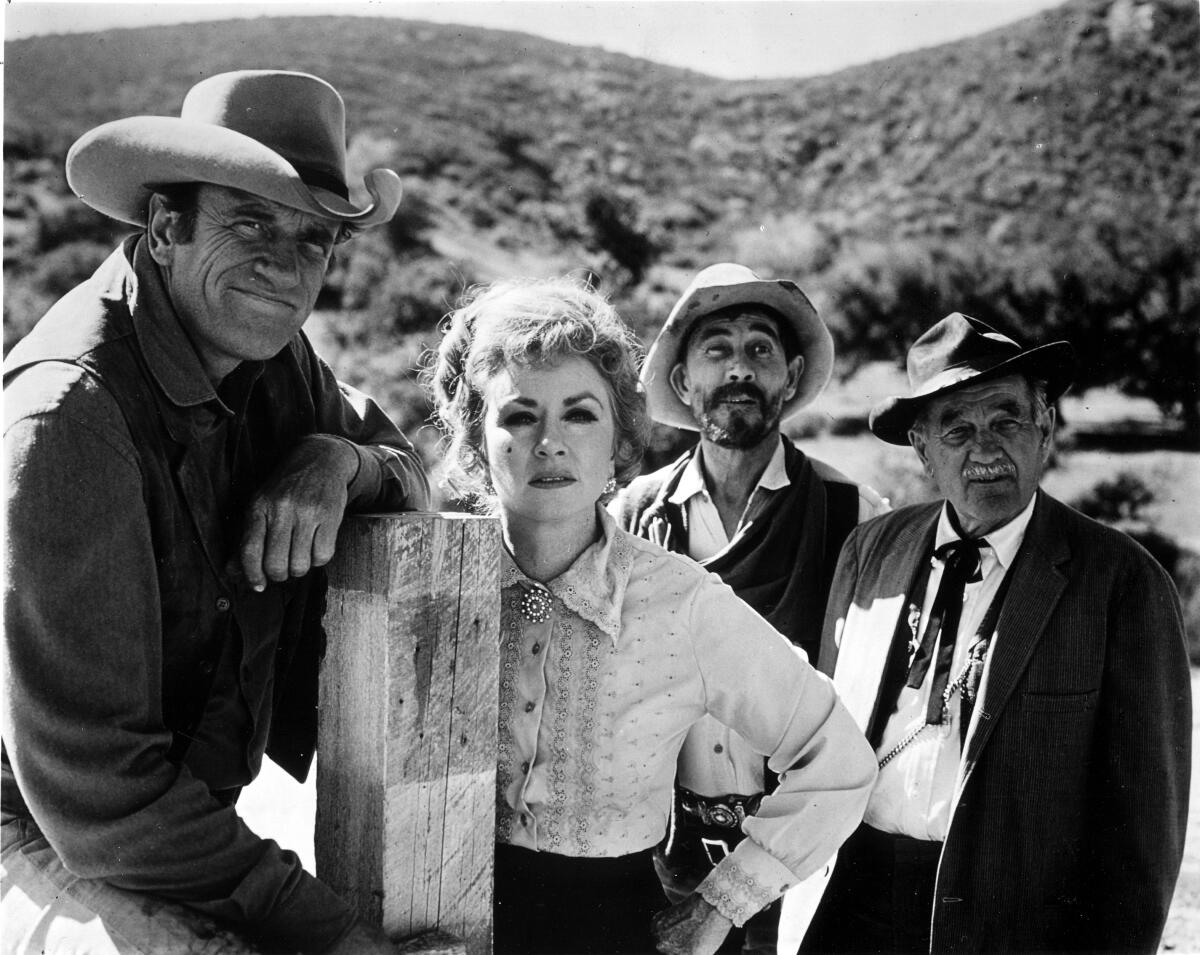 James Arness, Amanda Blake, Ken Curtis and Milburn Stone in "Gunsmoke."