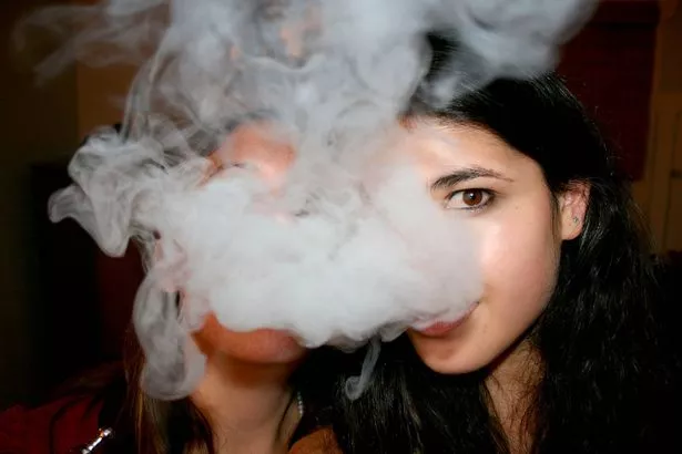 A woman vaping