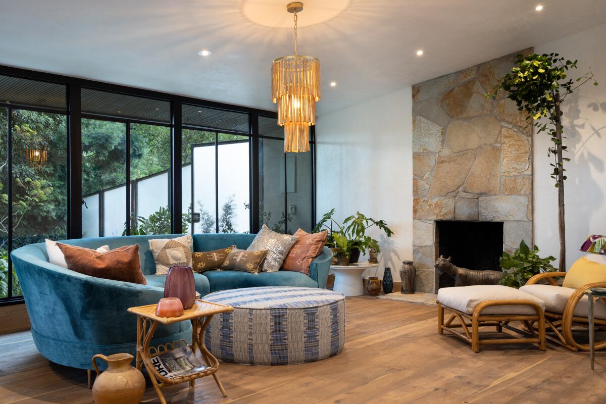A curvy couch adds interest to this room designed by Kim Gordon.