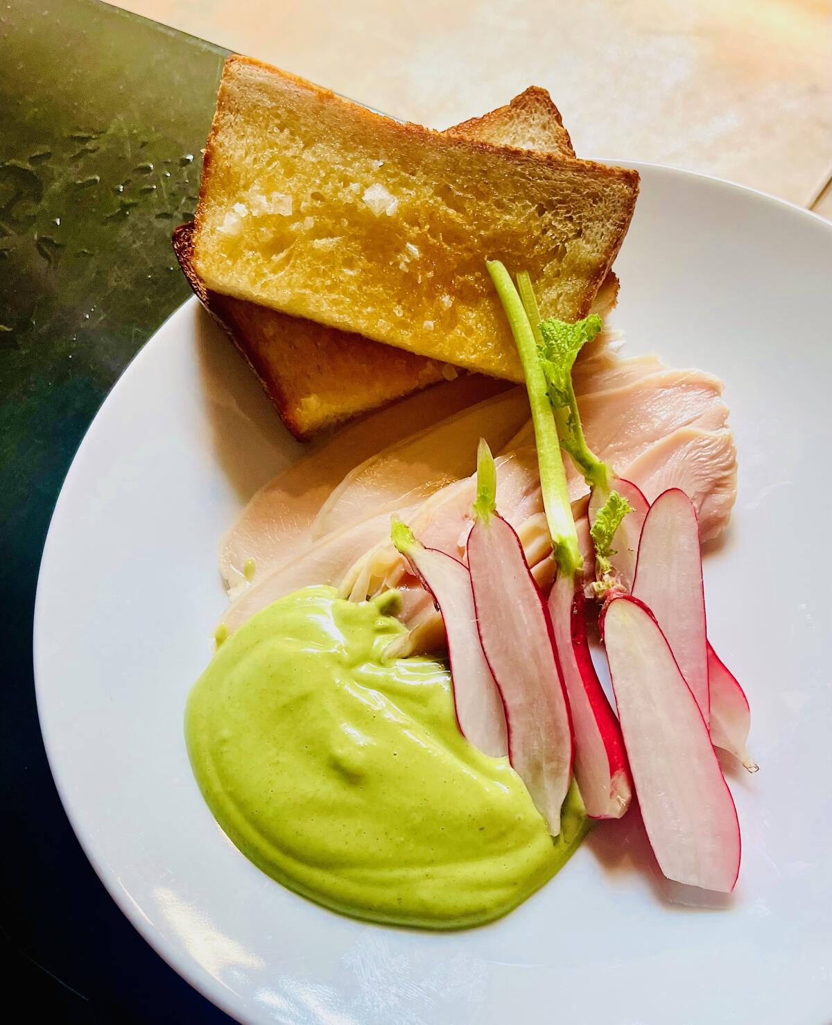 Chicken with radishes, tarragon mayonnaise and toasted milk bread at Cafe 2001 in downtown Los Angeles.