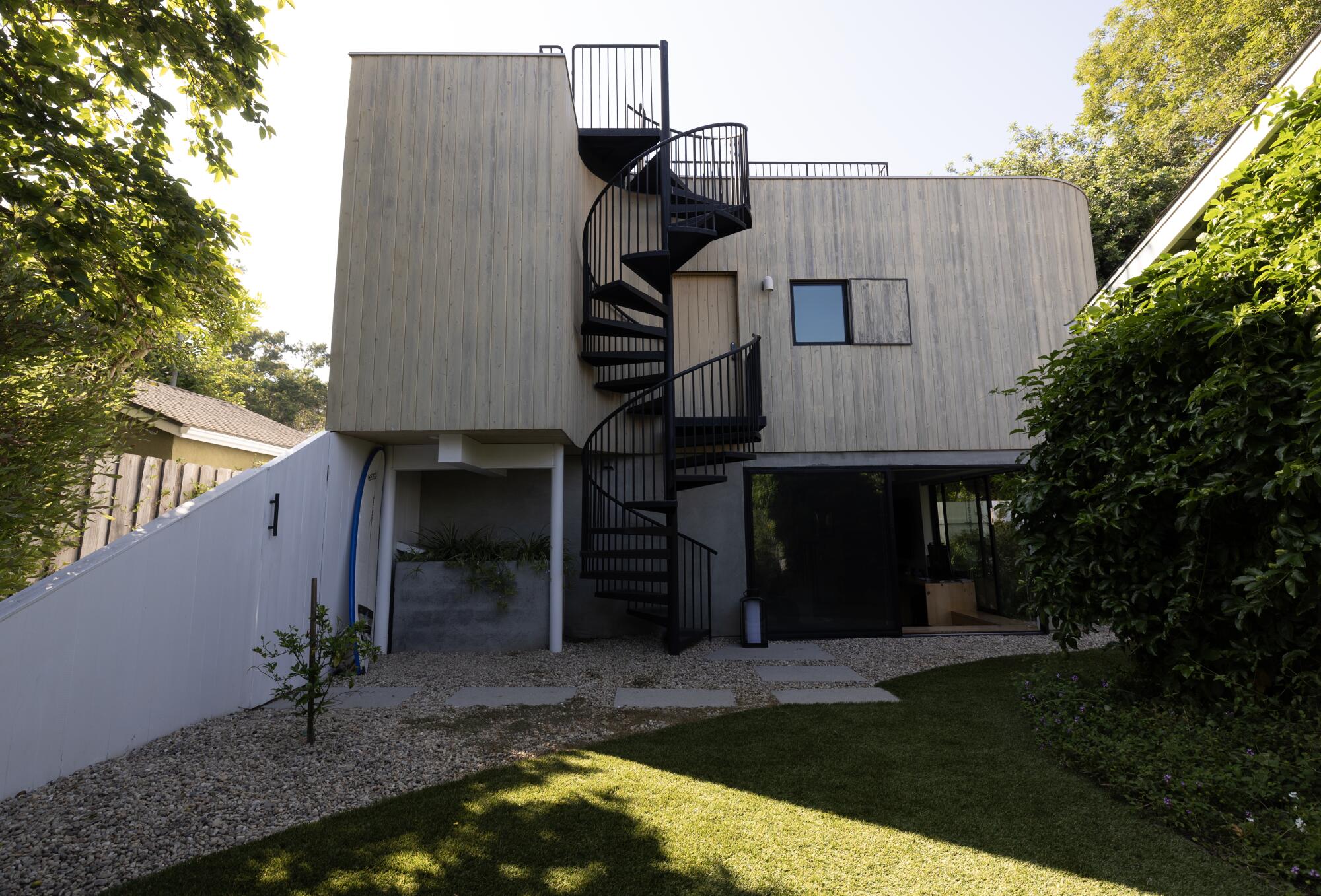 Two story ADU with steel spiral staircase 