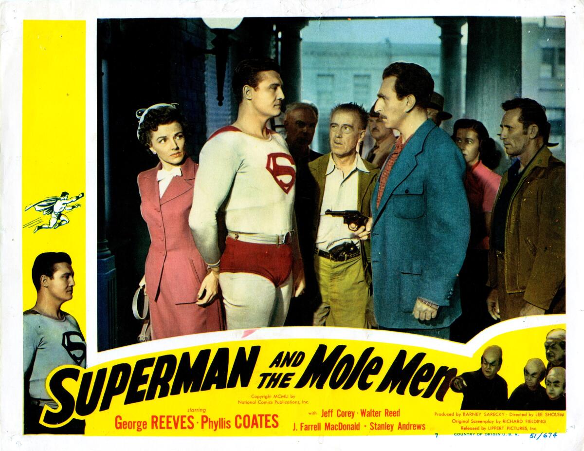 A yellow movie poster of Superman and the Mole Men showing Superman surrounded by a group of people.
