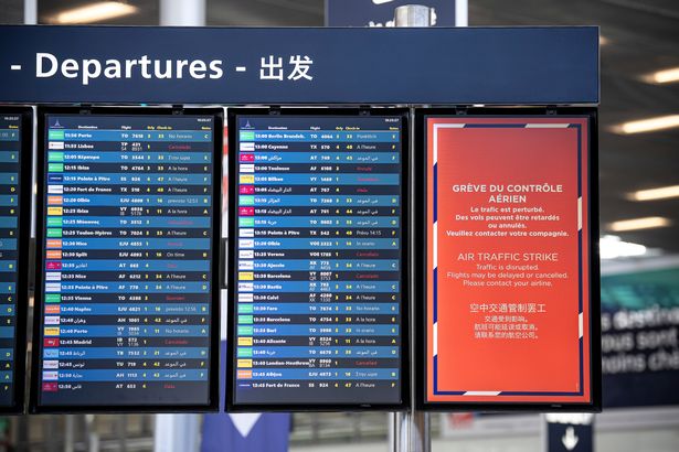 A departures information board is seen at Orly airport, near Paris, as French air traffic controllers launched a two-day strike to demand better working condition