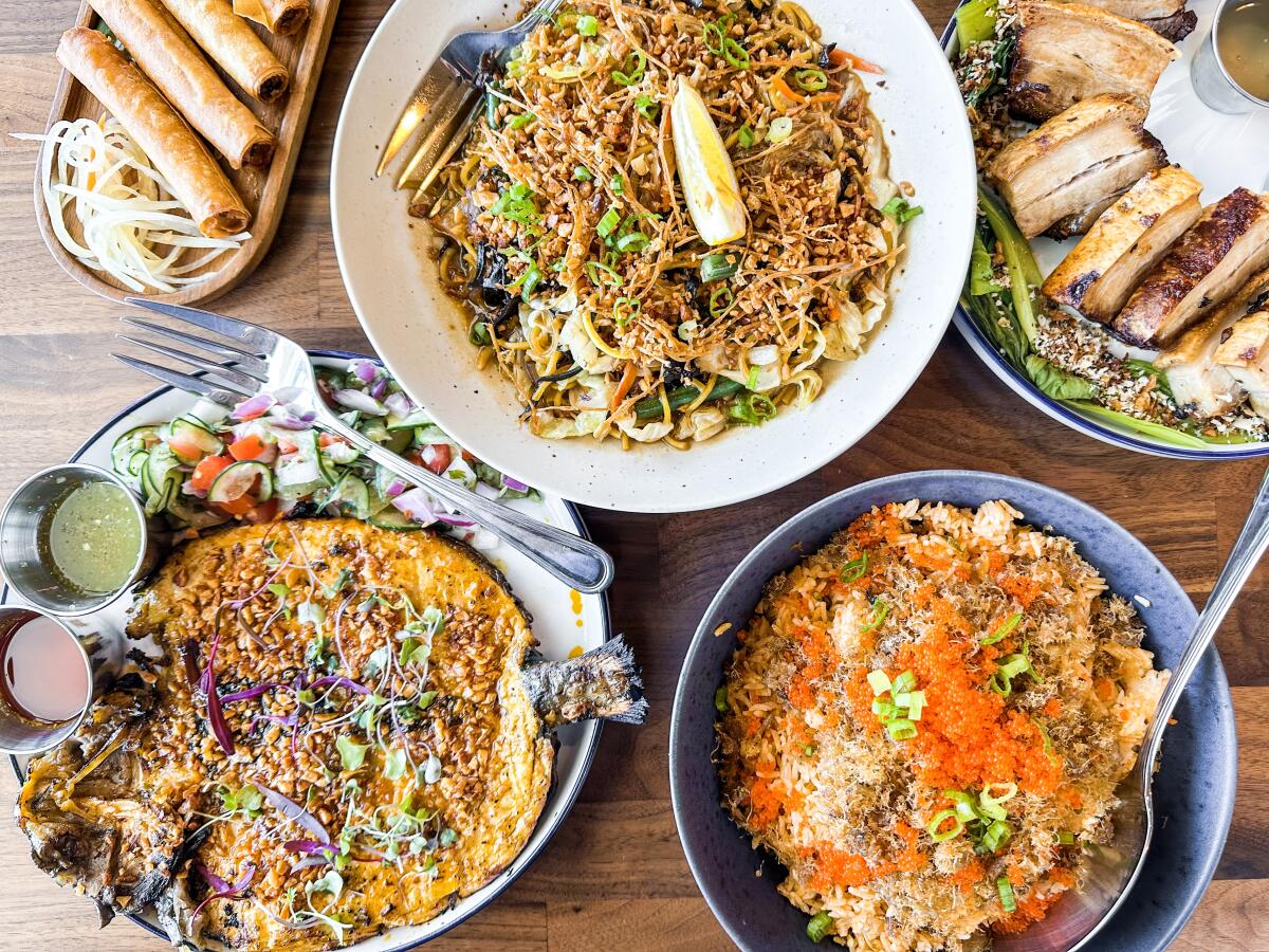 A spread of dishes at Manila Inasal in Silver Lake