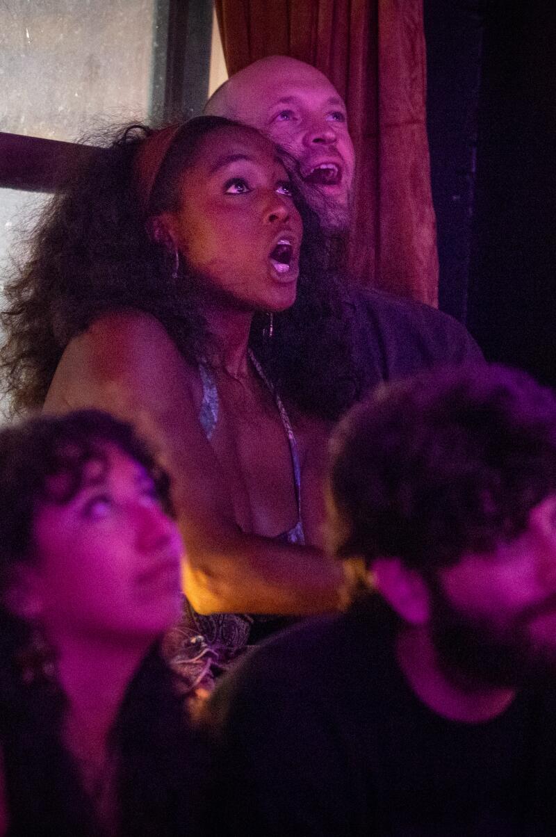 Fans of "Love Island USA" react to the show during the end of the watch party at the Palm & Pine.