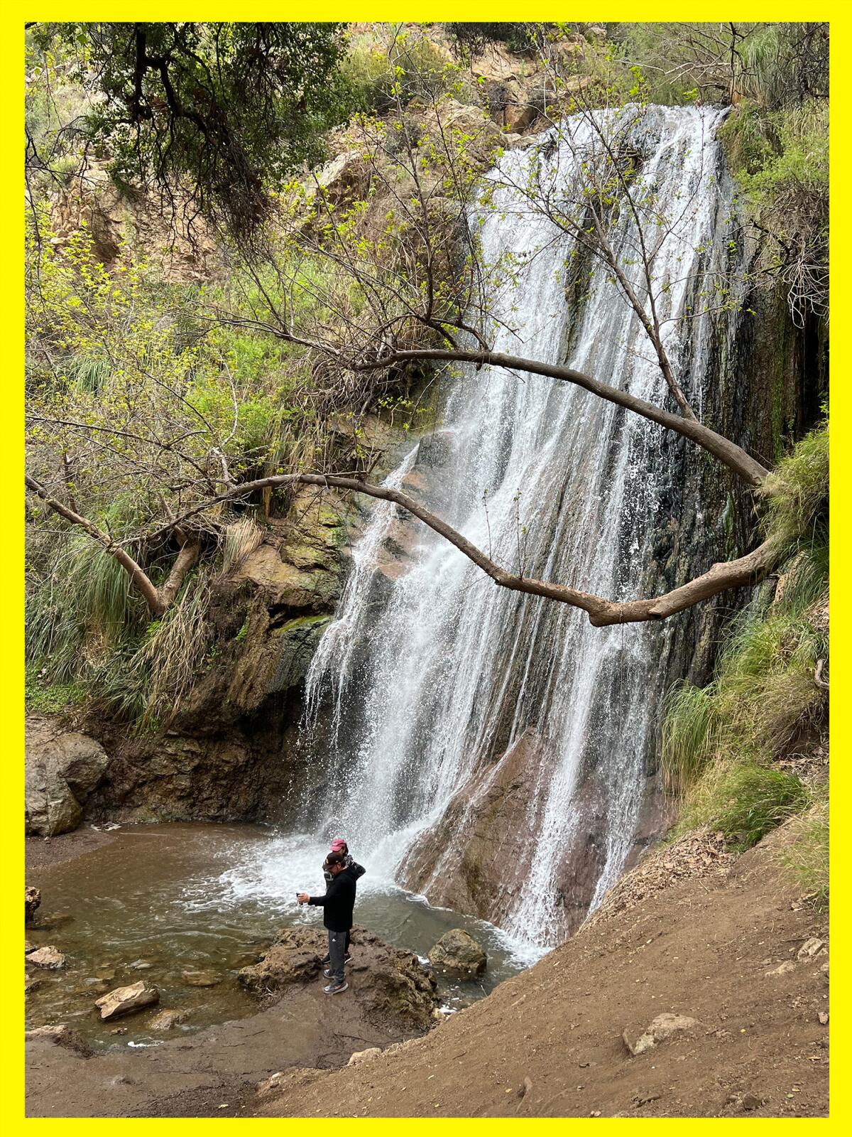 A hiker at the bottom of Escondido Falls.