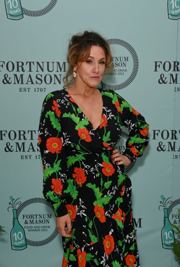 Grace Dent in a floral black dress.