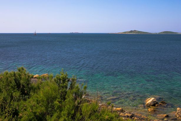 View west over The Road, the channel that separated the main island of St. Mary's from Samson and the other western isles: Isles of Scilly, UK