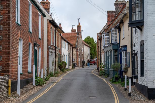 BLAKENEY, ENGLAND - SEPTEMBER 18: A general view of residential old cottage properties on Blakeney High Street on September 18, 2024 in Blakeney, United Kingdom. (Photo by John Keeble/Getty Images)